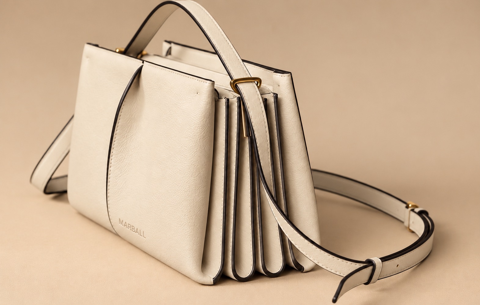 Detalle de cartera MARBALL en tonos naturales